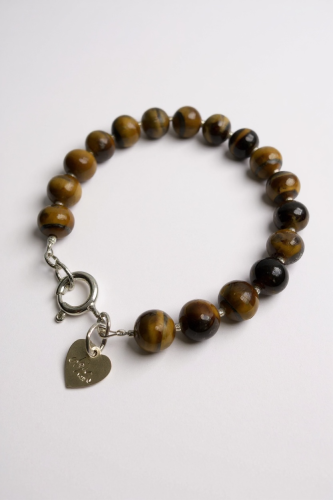 Bransoletka wykonana z polerowanych kulek tygrysiego oka