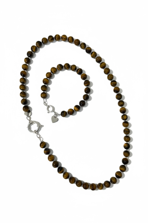 Komplet eleganckie biżuterii z kulek tygrysiego oka i srebra. Bransoletka i naszyjnik w stonowanych odcieniach brązu.