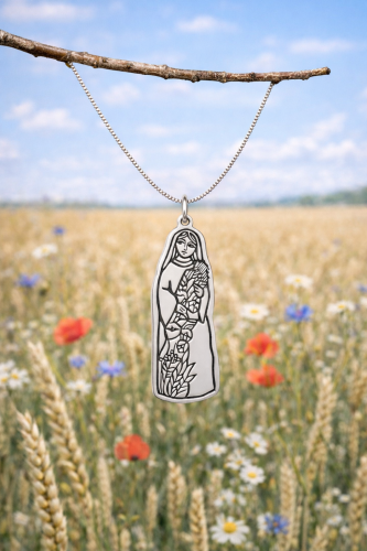 Srebrny medalik inspirowany polską sztuką ludową