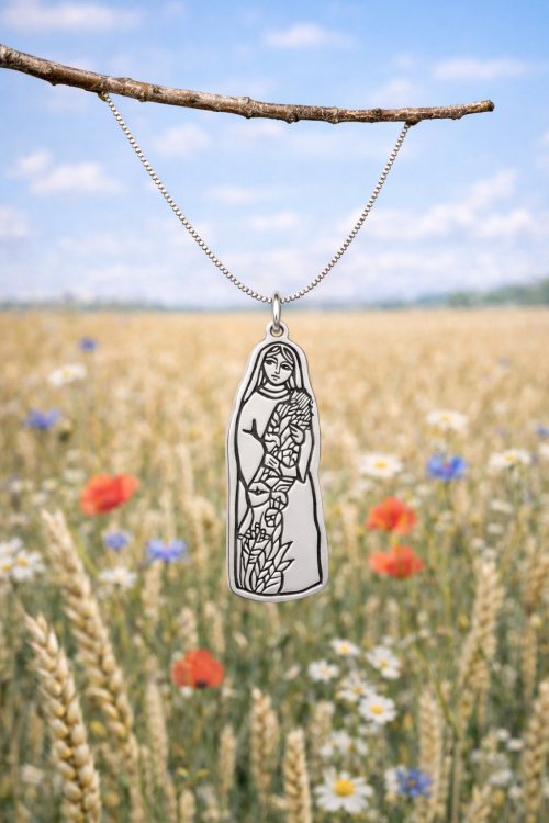 Srebrny medalik inspirowany polską sztuką ludową